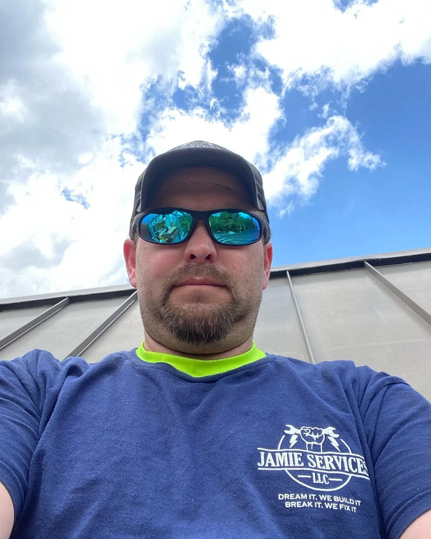 Jamie Deitrick in a Jamie Services shirt on a job site